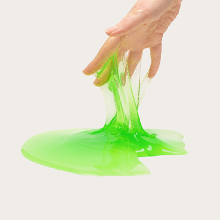 Image of a hand that has been covered in green slime