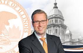 Illinois State Treasurer in front of state seal and capital building